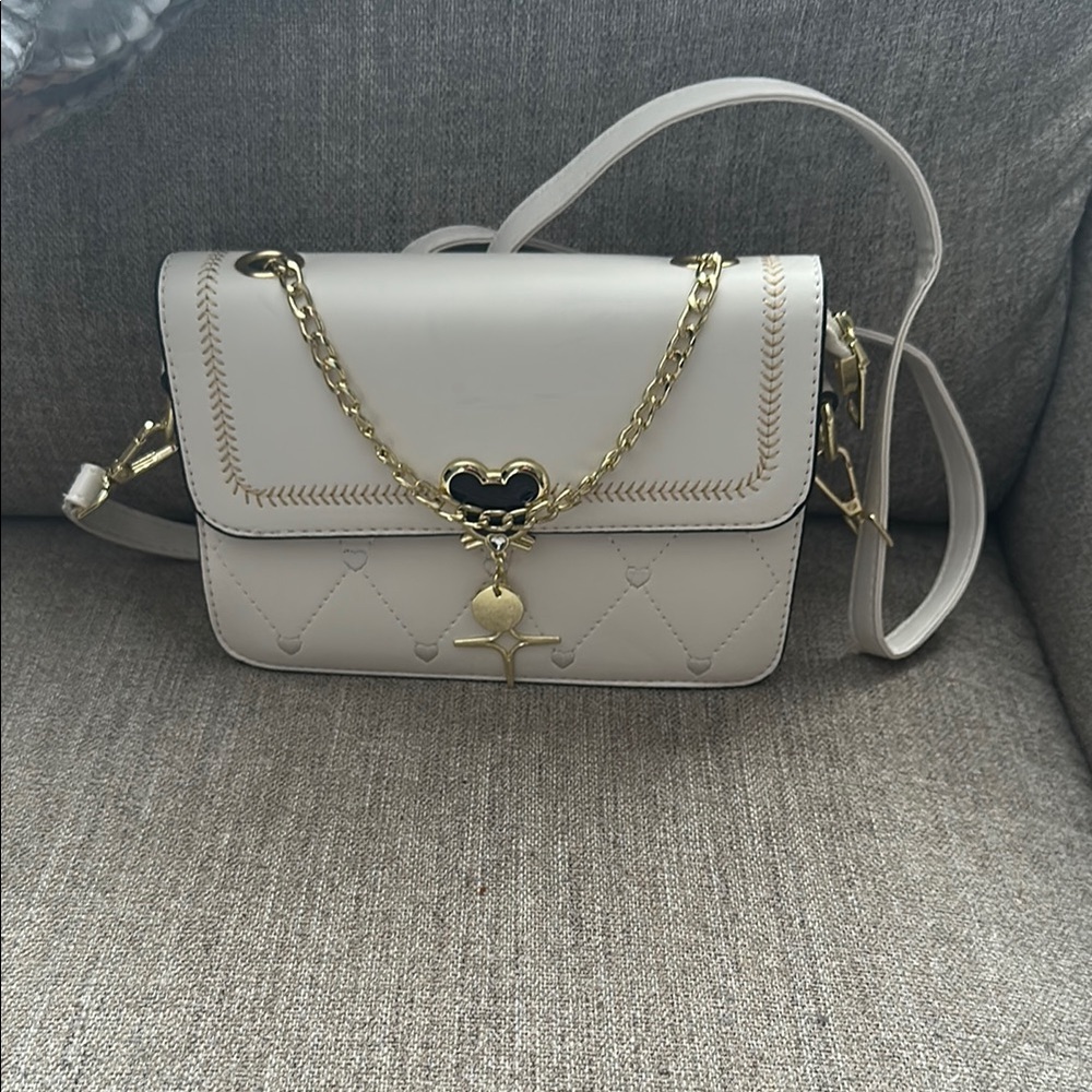 Elegant Cream Shoulder Bag with Gold Accents